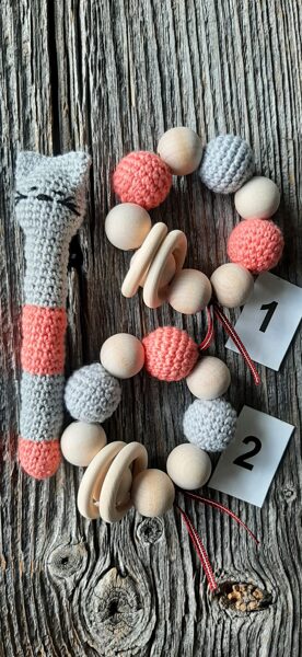 Graužamriņķis un grabulis "Kaķis".  Persiks un pelēks. Prieks un rotaļas mazulim. Pirmā rotaļlieta.